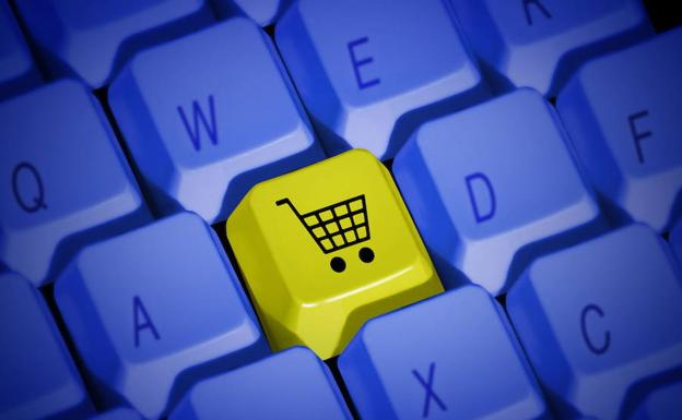 Tecla con el símbolo de un carrito de la compra./Fotolia-AdobeStock